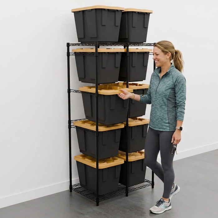 A woman stands next to a black bin rack that holds ten 12-gallon black and yellow storage bins.