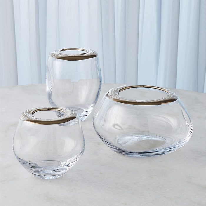 A collection of organic-formed vases from Kutmec. a perfect stylish touch for shelves or tables.
