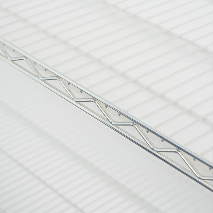 Transparent white shelf liner on a shelf of a silver wire rack.