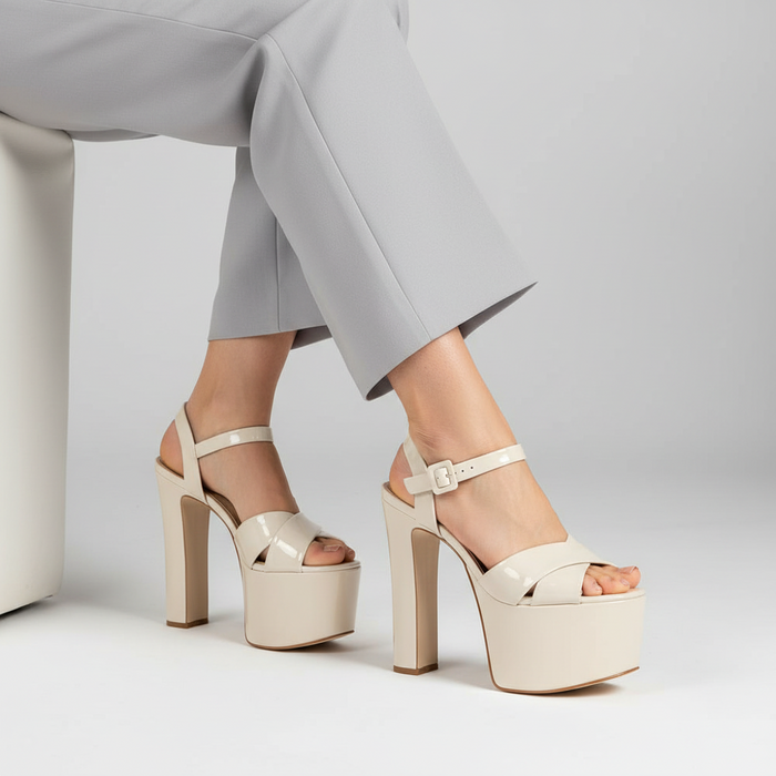 Zoe Platform Sandal Off White Patent Leather worn by a model